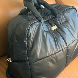 NWOT Black Puffer Travel bag